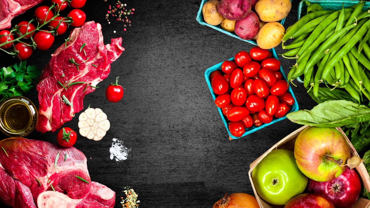 Fresh meats, vegetables, and fruits on a dark background, showcasing the variety of grocery items available for online shopping at Butcher & Farmer in Buckeye, Arizona.